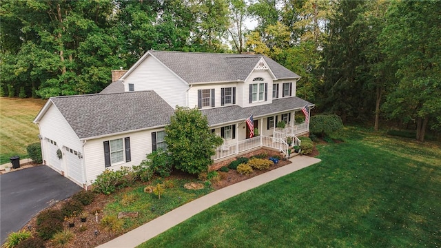 391 Browns Hill Rd, Middlesex Twp, PA 16059 - view of front of house with covered porch, driveway, roof with shingles, and an attached garage