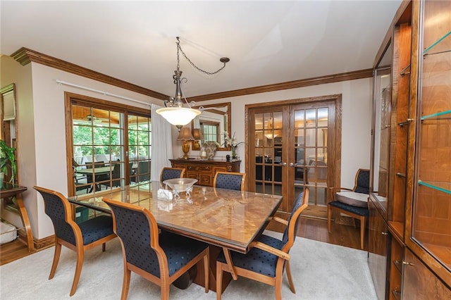 391 Browns Hill Rd, Middlesex Twp, PA 16059 - dining space featuring french doors, ornamental molding, and wood finished floors