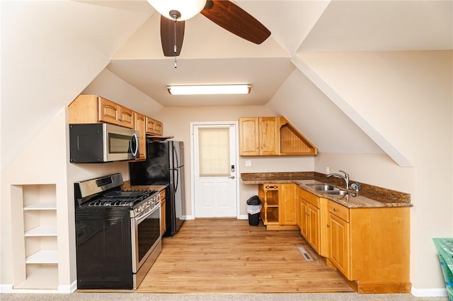 391 Browns Hill Rd, Middlesex Twp, PA 16059 - kitchen with appliances with stainless steel finishes, dark stone counters, light wood finished floors, vaulted ceiling, and built in shelves
