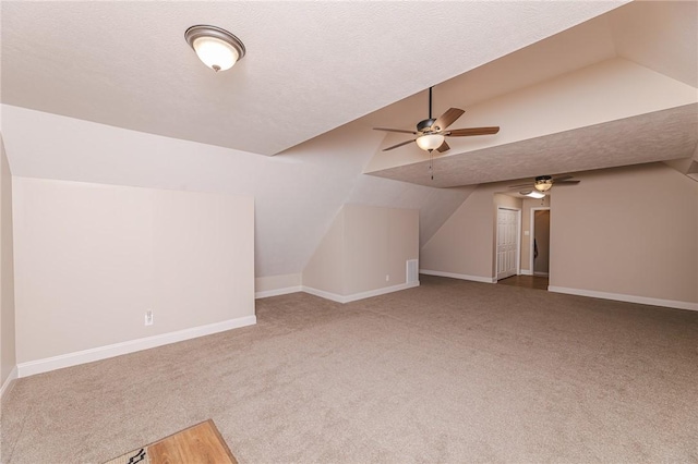 391 Browns Hill Rd, Middlesex Twp, PA 16059 - bonus room featuring vaulted ceiling, ceiling fan, and carpet