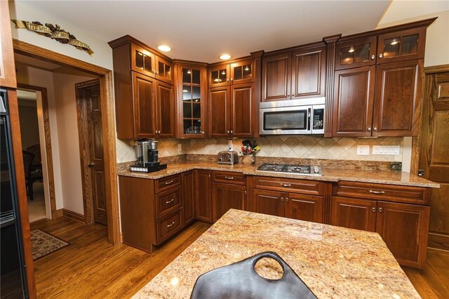 391 Browns Hill Rd, Middlesex Twp, PA 16059 - kitchen featuring appliances with stainless steel finishes, dark wood-style floors, light stone counters, and recessed lighting