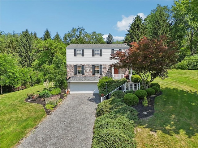 105 Gary Dr, Ohio Twp, PA 15143 - view of front of property featuring an attached garage, stone siding, asphalt driveway, and stairway