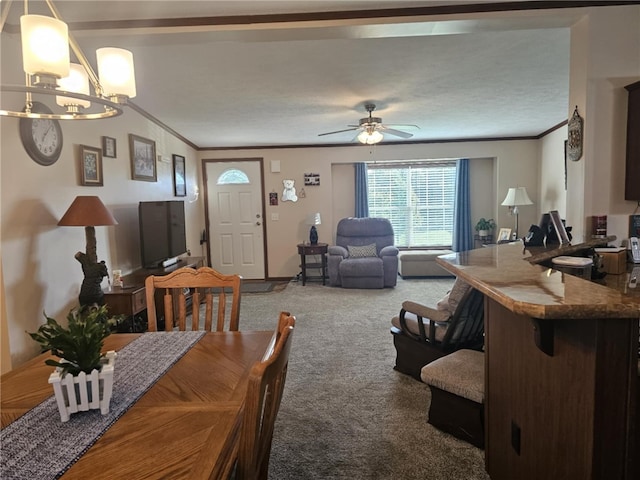 304 Bennington Rd, North Union Twp, PA 15445 - dining area featuring carpet flooring, ornamental molding, a chandelier, and a ceiling fan