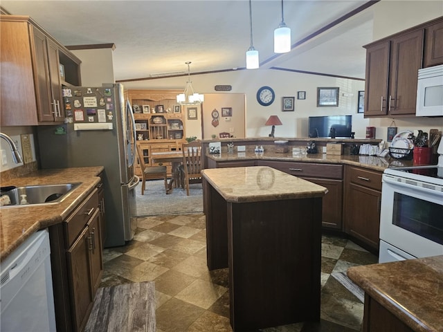 304 Bennington Rd, North Union Twp, PA 15445 - kitchen featuring white appliances, a chandelier, hanging light fixtures, a peninsula, and dark brown cabinetry