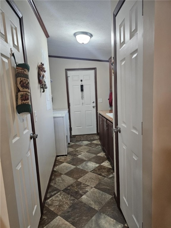 304 Bennington Rd, North Union Twp, PA 15445 - hall with a textured ceiling, ornamental molding, and dark stone finish floors