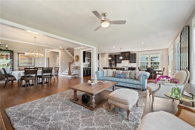 1735 Stevensan Dr, Franklin Park, PA 15143 - living room with stairway, dark wood-style flooring, a chandelier, and a ceiling fan
