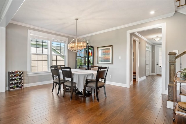 1735 Stevensan Dr, Franklin Park, PA 15143 - dining space featuring a chandelier, dark wood-style flooring, ornamental molding, stairway, and recessed lighting