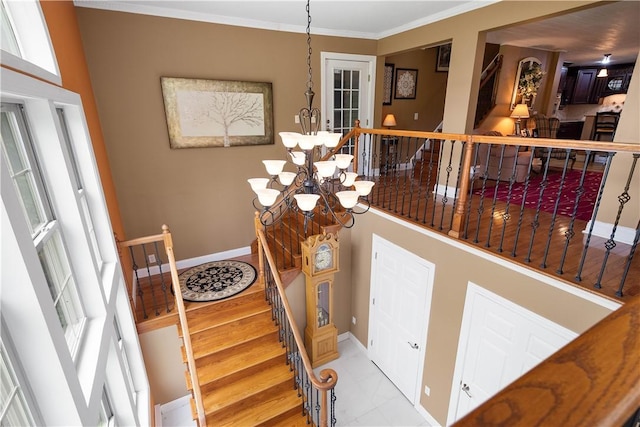 102 Klages Rd, Donegal, PA 15376 - foyer with a chandelier, ornamental molding, stairs, and marble look tile flooring