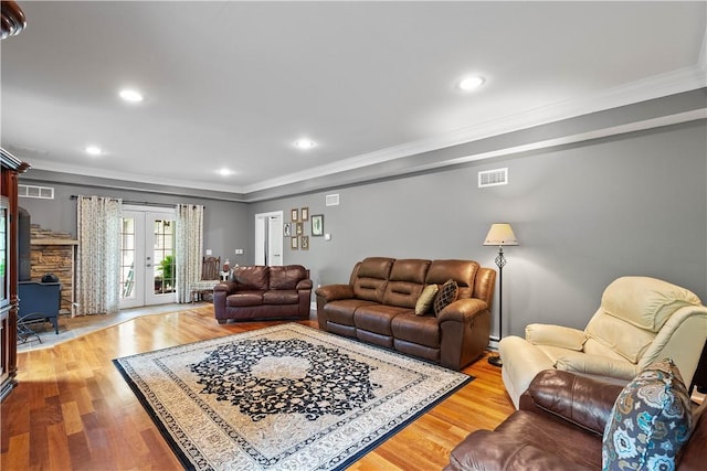 102 Klages Rd, Donegal, PA 15376 - living area featuring french doors, ornamental molding, light wood-type flooring, and recessed lighting