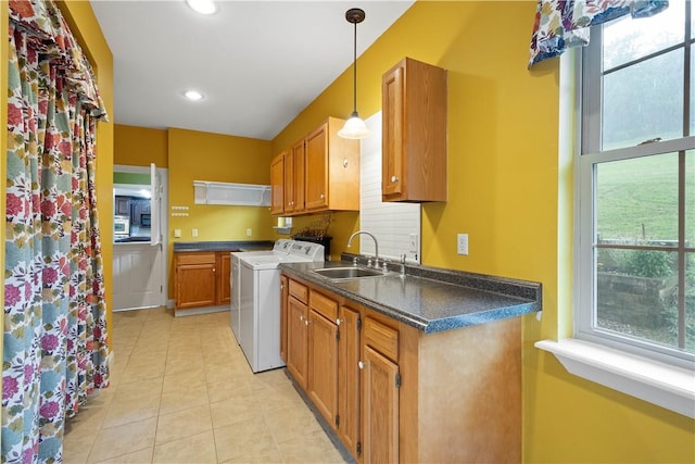 102 Klages Rd, Donegal, PA 15376 - kitchen with dark countertops, light tile patterned flooring, brown cabinetry, pendant lighting, and recessed lighting