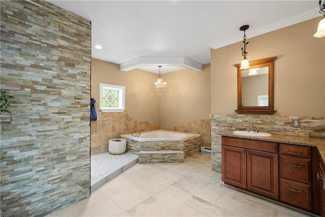 102 Klages Rd, Donegal, PA 15376 - full bathroom featuring a garden tub, vanity, a chandelier, and a baseboard radiator