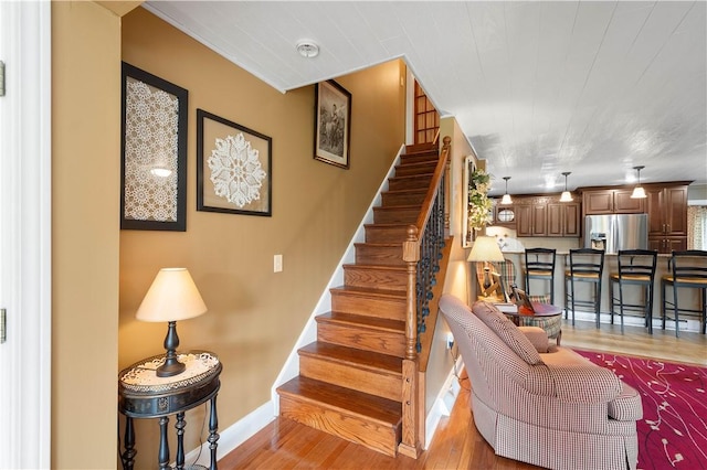 102 Klages Rd, Donegal, PA 15376 - stairway featuring wood finished floors and baseboards