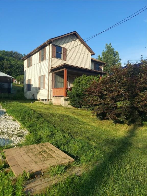 406 Walnut St, Sugarcreek, PA 16343 - back of property featuring a lawn