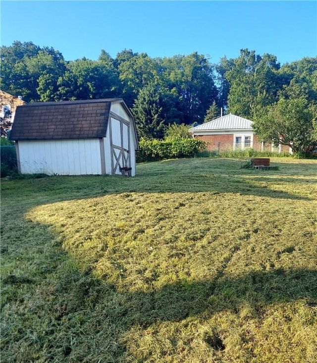 406 Walnut St, Sugarcreek, PA 16343 - view of green lawn with a shed