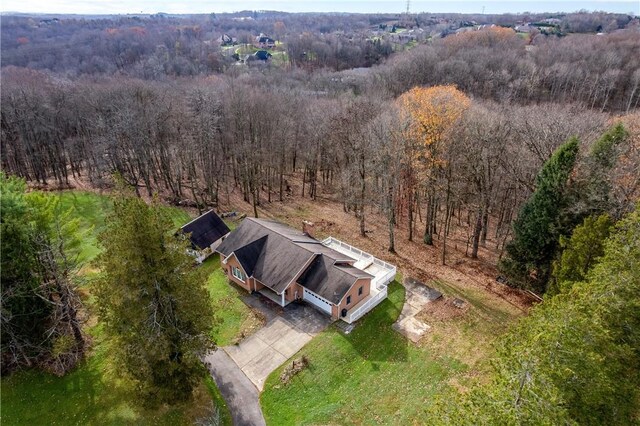 1664 N Main St, Center Twp, PA 16001 - aerial view of property and surrounding area featuring a heavily wooded area