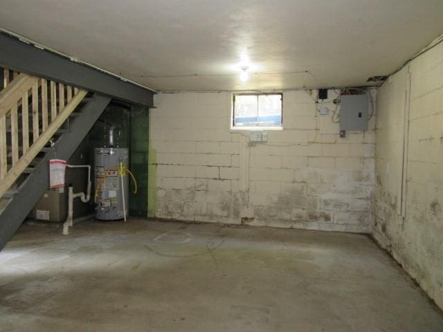 438 Saratoga Dr, Pleasant Hills, PA 15236 - basement with gas water heater, electric panel, and stairs