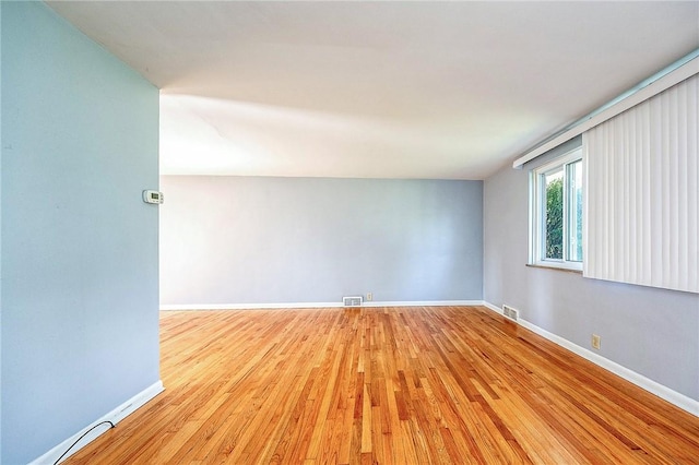 223 Larue Dr, Moon/Crescent Twp, PA 15108 - unfurnished room featuring wood finished floors