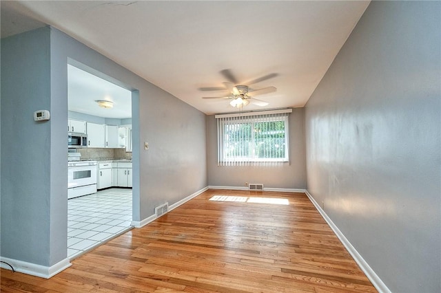 223 Larue Dr, Moon/Crescent Twp, PA 15108 - empty room featuring a ceiling fan and light wood finished floors