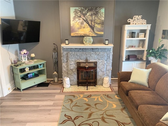 74 Wilson St, Etna, PA 15223 - living area featuring wood finished floors and a fireplace