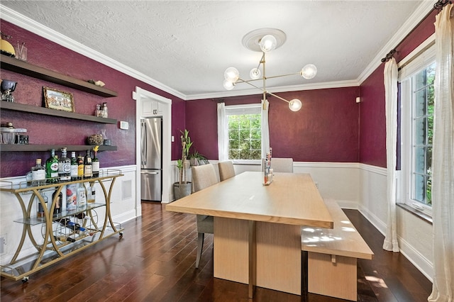 590 Kenilworth Dr, Mt Lebanon, PA 15228 - dining room with dark wood-style floors, ornamental molding, a wainscoted wall, and a textured ceiling