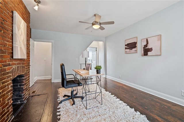 4228 Post St, Lawrenceville, PA 15201 - office with hardwood / wood-style flooring, a ceiling fan, and a fireplace