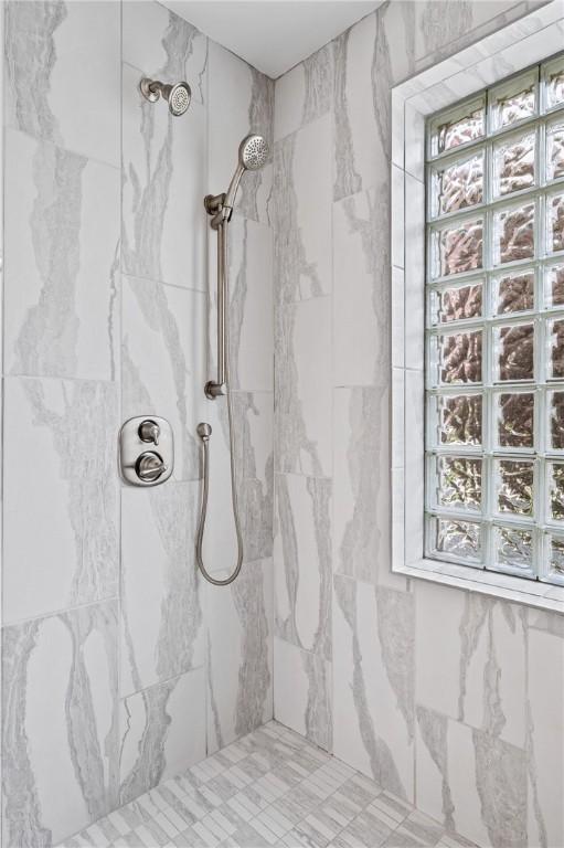 4228 Post St, Lawrenceville, PA 15201 - full bath featuring a marble finish shower and healthy amount of natural light