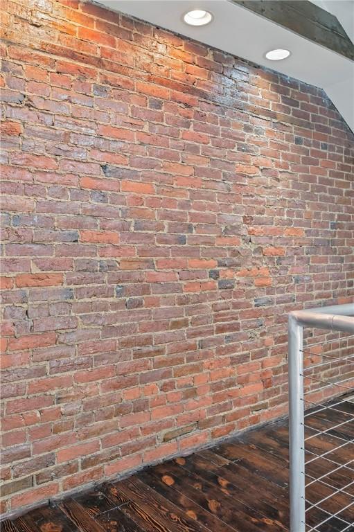 4228 Post St, Lawrenceville, PA 15201 - detailed view of brick wall, wood finished floors, and recessed lighting