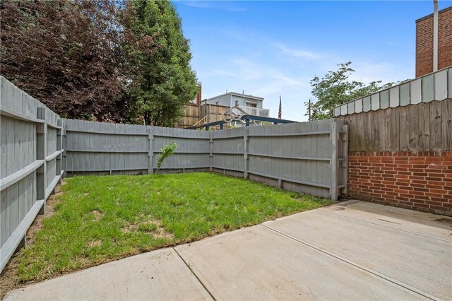 4228 Post St, Lawrenceville, PA 15201 - fenced backyard featuring a patio area