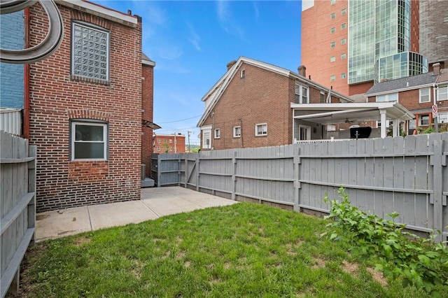 4228 Post St, Lawrenceville, PA 15201 - fenced backyard featuring a patio area