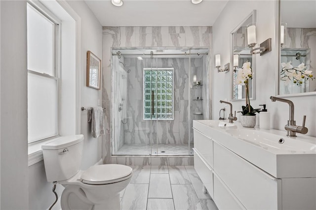 4228 Post St, Lawrenceville, PA 15201 - bathroom with marble look tile flooring, a marble finish shower, double vanity, and recessed lighting