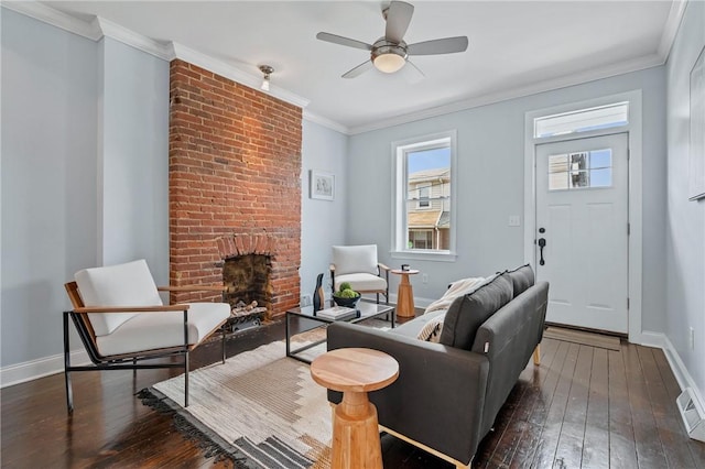 4228 Post St, Lawrenceville, PA 15201 - living room with wood-type flooring, a brick fireplace, ceiling fan, and ornamental molding