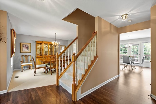 206 Buckeye Ct, Nottingham, PA 15330 - staircase with a chandelier and wood finished floors