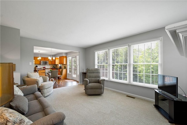 206 Buckeye Ct, Nottingham, PA 15330 - living area featuring baseboards and light carpet