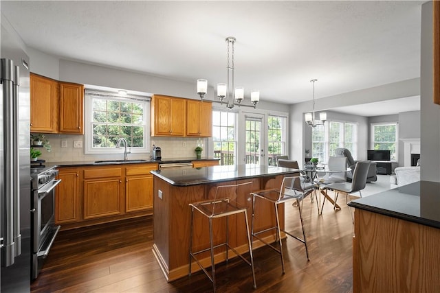 206 Buckeye Ct, Nottingham, PA 15330 - kitchen with dark countertops, stainless steel appliances, and dark wood-type flooring