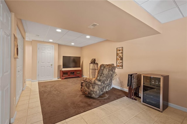 206 Buckeye Ct, Nottingham, PA 15330 - sitting room featuring beverage cooler, light tile patterned floors, recessed lighting, light colored carpet, and a paneled ceiling