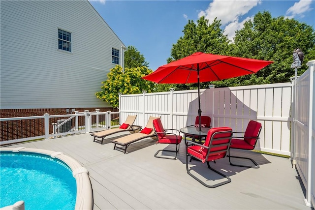206 Buckeye Ct, Nottingham, PA 15330 - view of swimming pool with outdoor dining space and a wooden deck