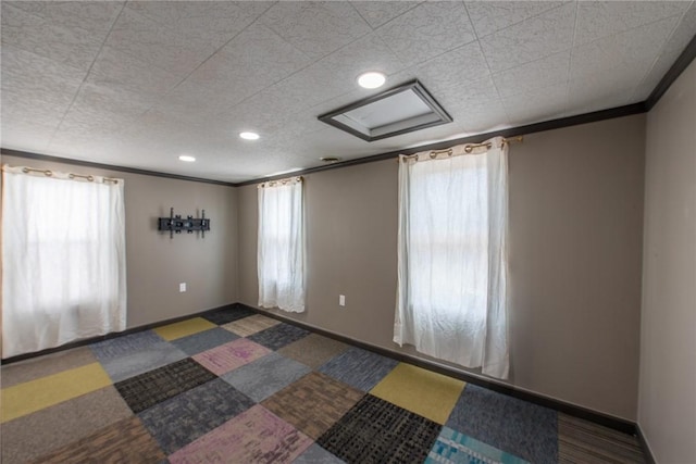430 Kennedy Ave, East Vandergrift, PA 15629 - spare room with recessed lighting, crown molding, and carpet