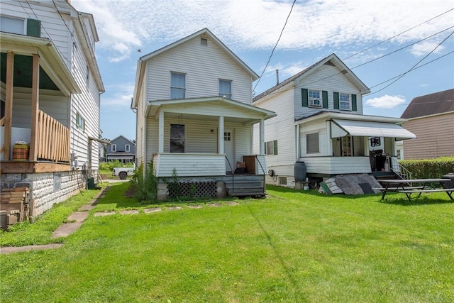 430 Kennedy Ave, East Vandergrift, PA 15629 - view of front of home featuring covered porch and a front lawn