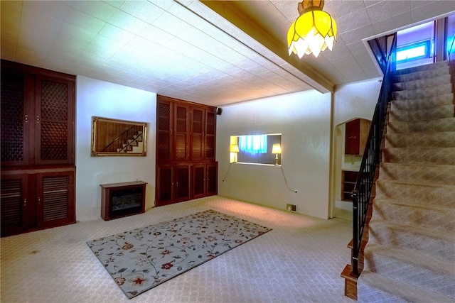 608 Shady Ave, Charleroi Boro, PA 15022 - unfurnished living room with carpet, stairway, and arched walkways