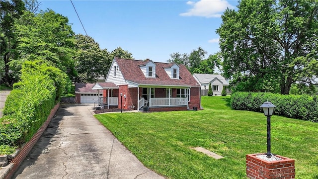 3259 Brodhead Rd, Center Twp, PA 15001 - cape cod home with covered porch, brick siding, a front yard, and a garage