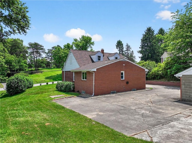 3259 Brodhead Rd, Center Twp, PA 15001 - back of house with brick siding, a yard, a patio, and a chimney