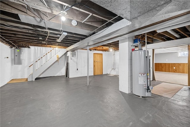 3259 Brodhead Rd, Center Twp, PA 15001 - basement with gas water heater, electric panel, stairway, and wood walls