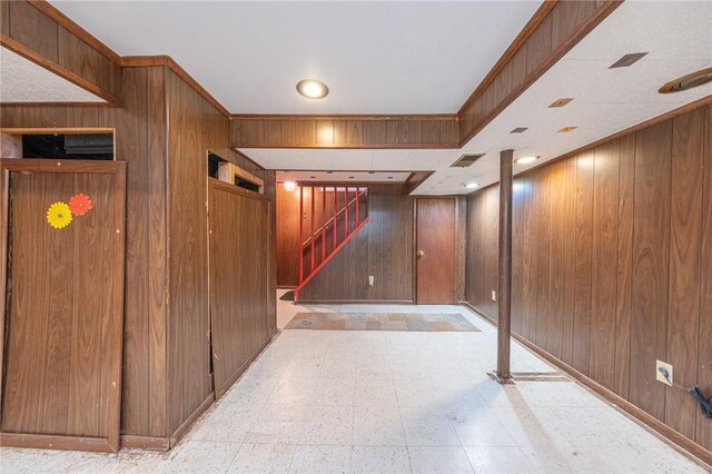1445 Stanley Dr, Penn Hills, PA 15147 - finished basement featuring stairs, wooden walls, and light floors