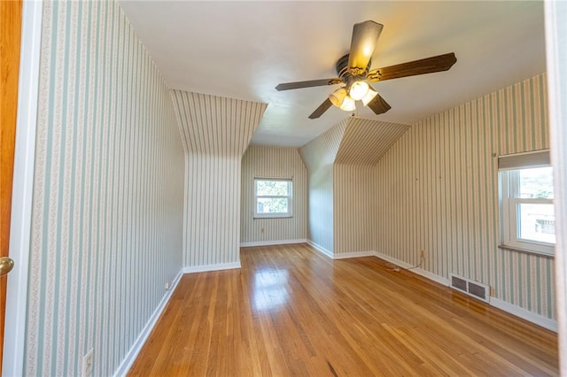 1445 Stanley Dr, Penn Hills, PA 15147 - bonus room with wallpapered walls, light wood-style flooring, and ceiling fan