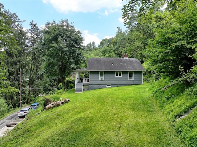 108 Hird Rd, Trafford, PA 15085 - back of house with a yard, stairway, a chimney, and a view of trees