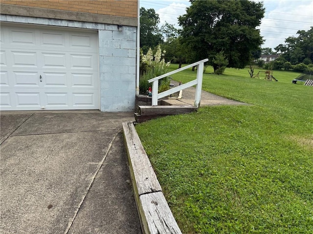 410 Hershey Rd, Penn Hills, PA 15235 - garage featuring driveway