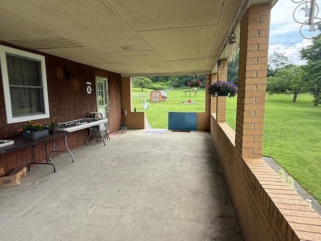 410 Hershey Rd, Penn Hills, PA 15235 - covered porch featuring a yard