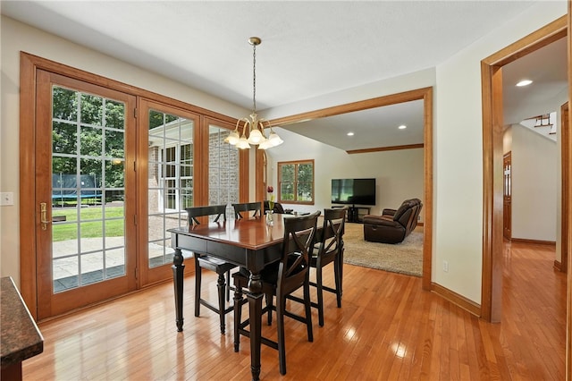 1023 Sophia Ln, Adams Twp, PA 16046 - dining room featuring plenty of natural light, a chandelier, and light wood-type flooring