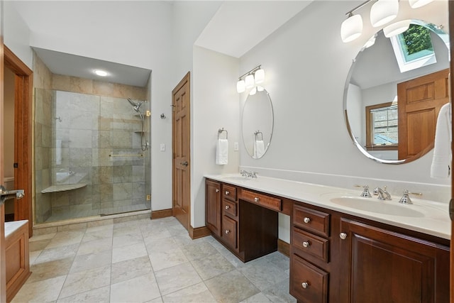 1023 Sophia Ln, Adams Twp, PA 16046 - full bathroom featuring double vanity, a skylight, a shower stall, and plenty of natural light
