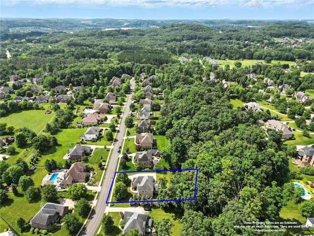 1023 Sophia Ln, Adams Twp, PA 16046 - aerial view of residential area with a heavily wooded area and property parcel outlined